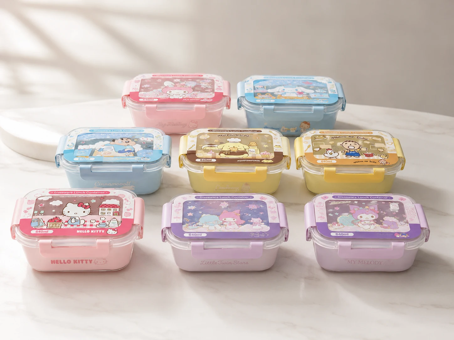 Examples of customized character-themed glass food containers produced for a customer project